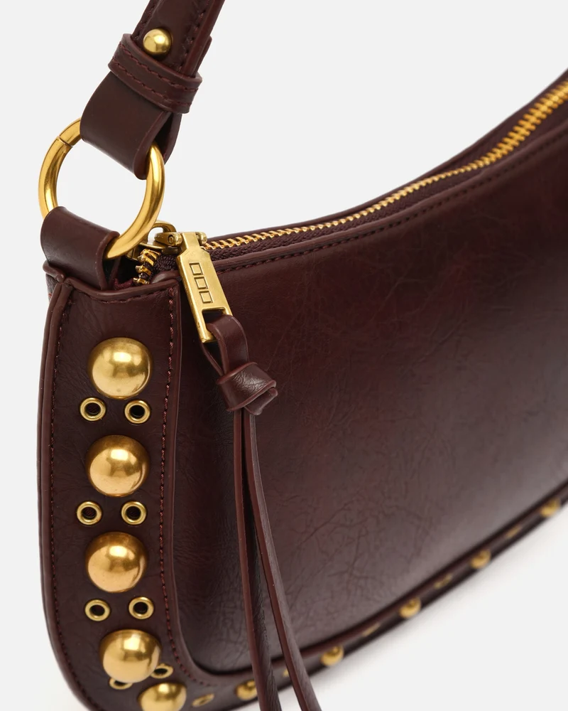Maden bolso de hombro pequeño con detalles metálicos