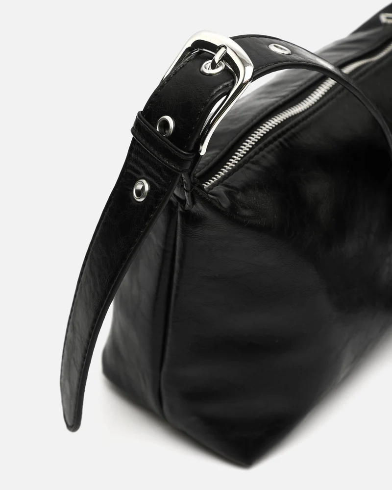 Gosti bolso bandolera pequeño con detalles metálicos