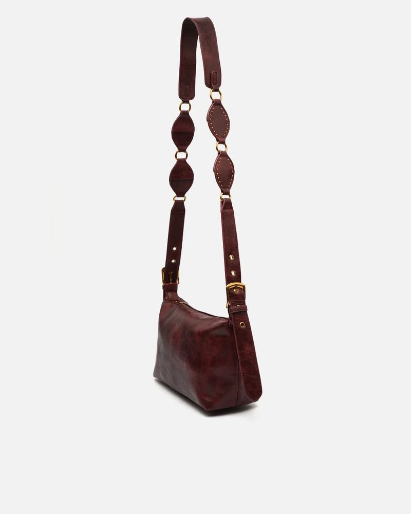 Gosti bolso bandolera pequeño con detalles metálicos