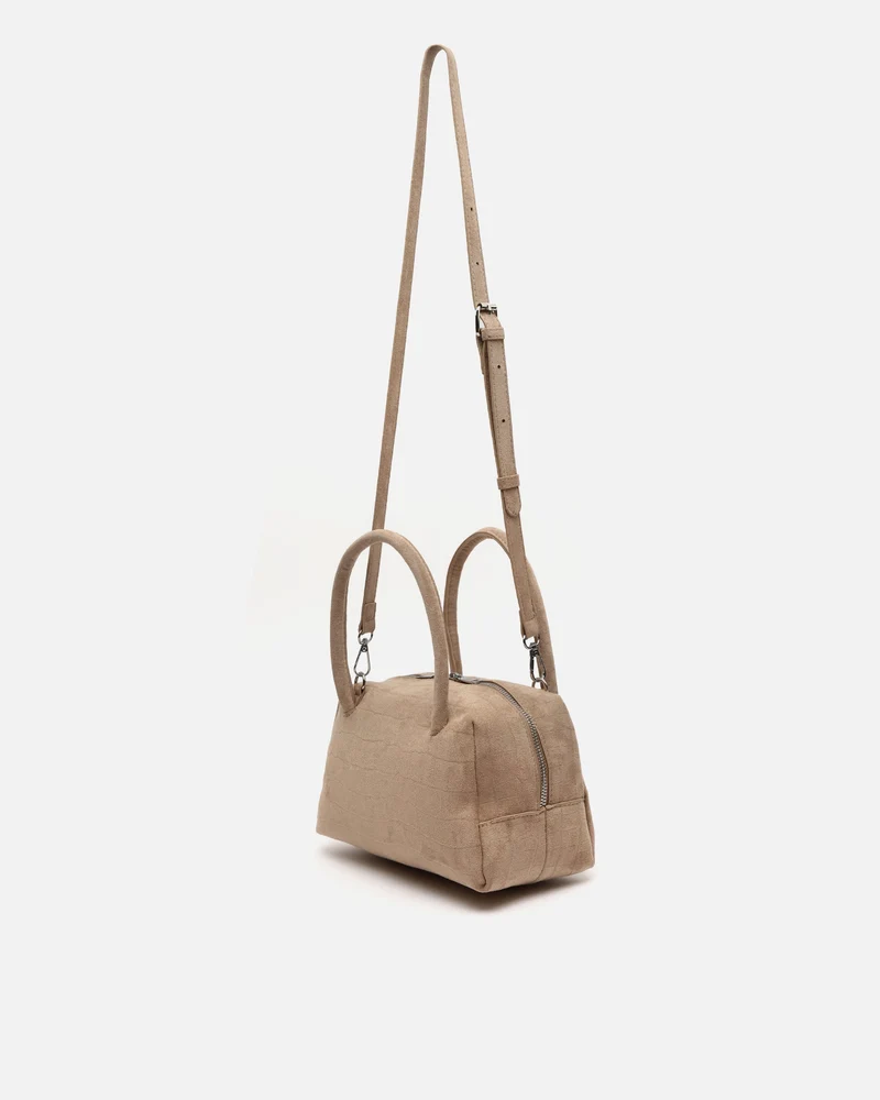 Croquito bolso de mano efecto ante con grabado animal print y asa bandolera extraíble