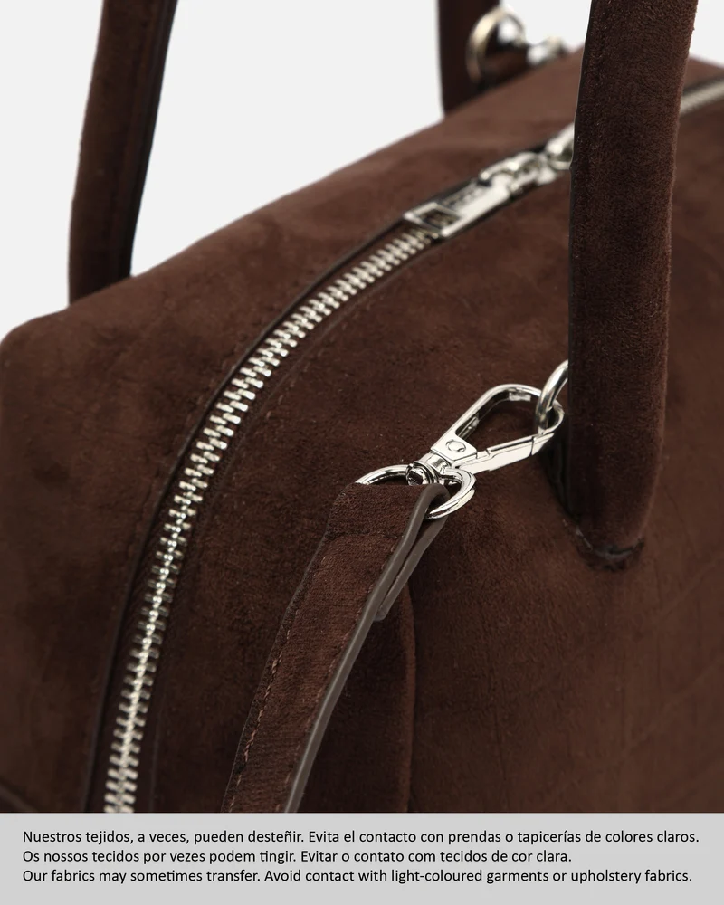 Croquito bolso de mano efecto ante con grabado animal print y asa bandolera extraíble