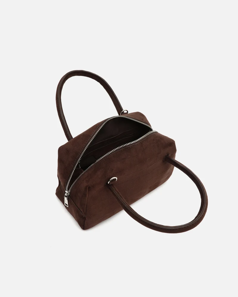 Croquito bolso de mano efecto ante con grabado animal print y asa bandolera extraíble
