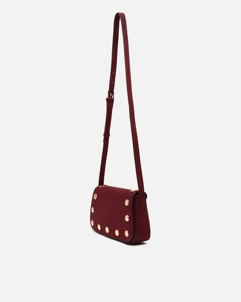 Nemu bolso bandolera pequeño efecto ante con detalles metálicos grandes