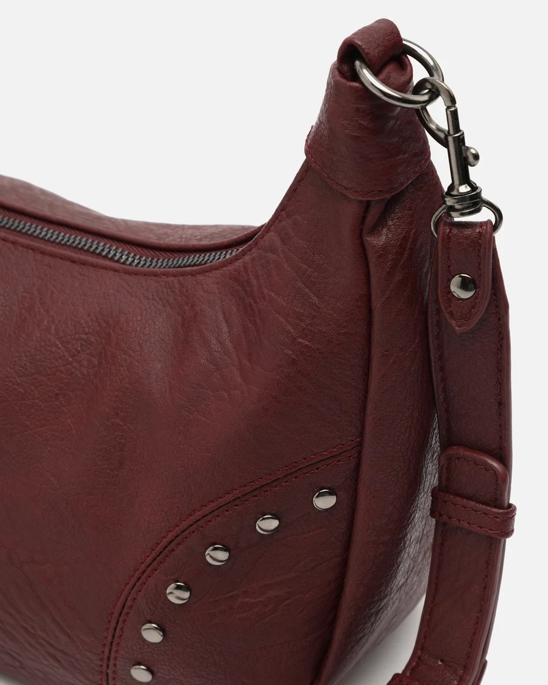 Serenitys bolso bandolera con detalles metálicos
