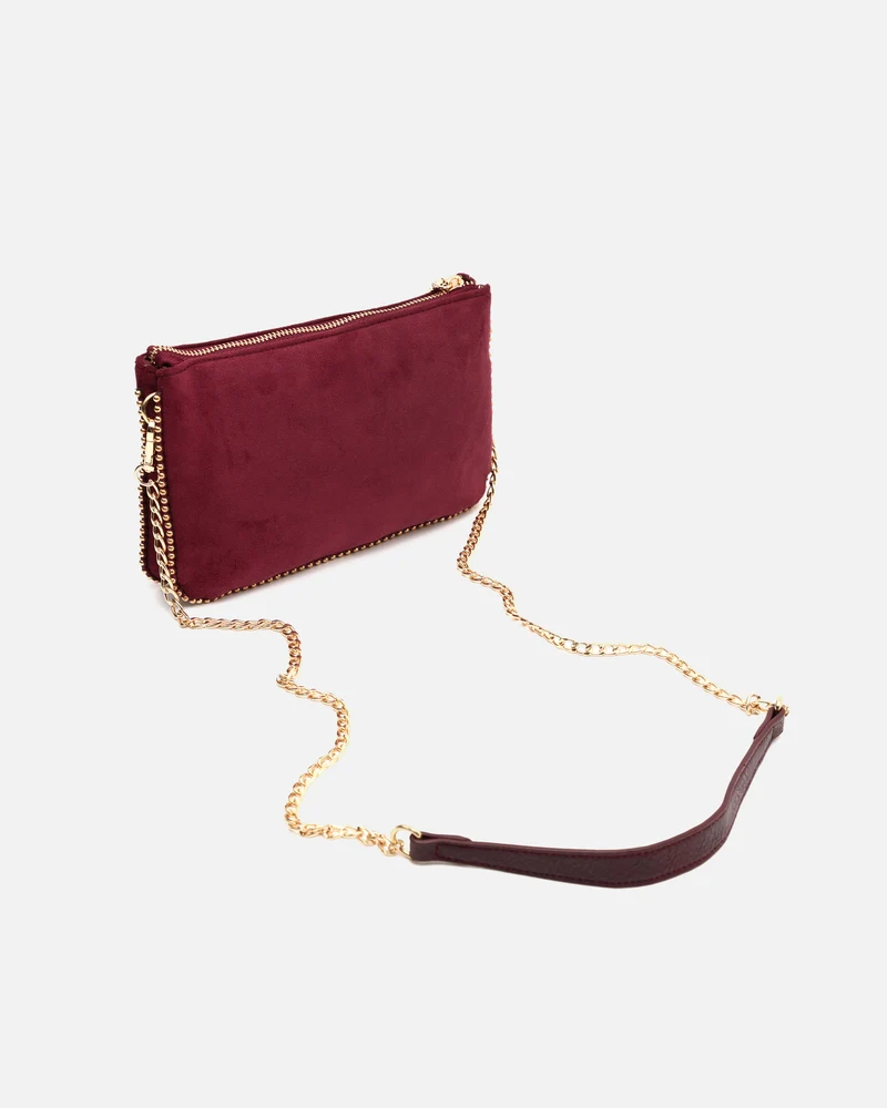 Boleo bolso bandolera efecto ante y con detalles metálicos