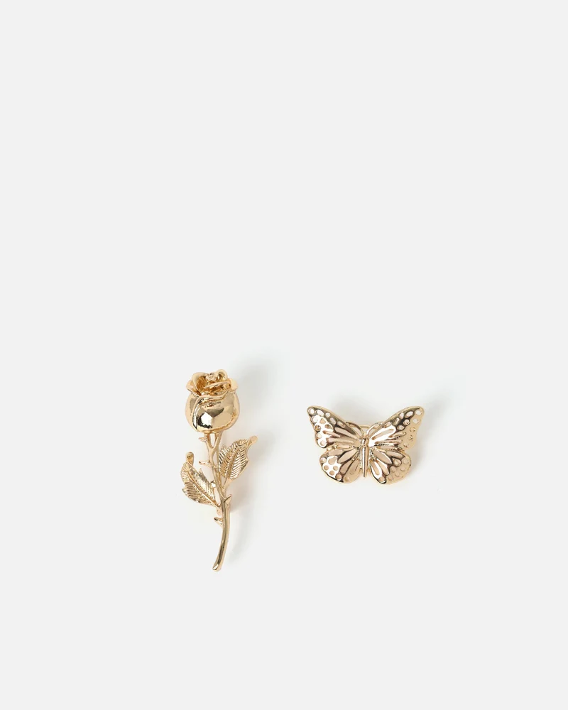 Flor broche flor y mariposa