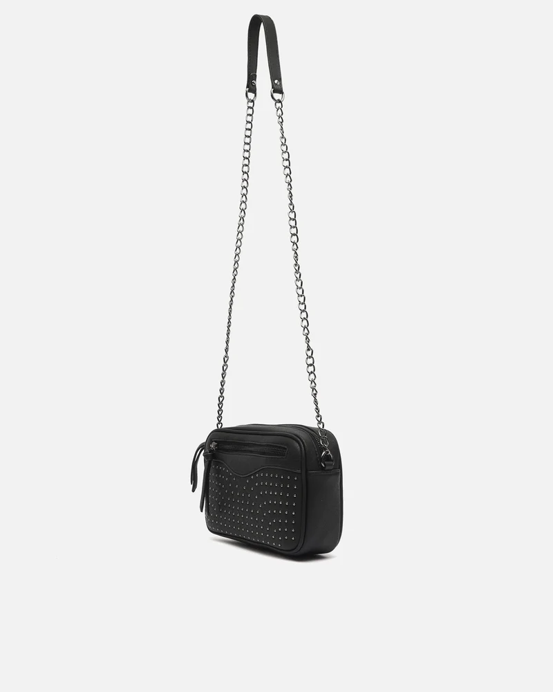 Koretos bolso bandolera pequeño con detalles metálicos