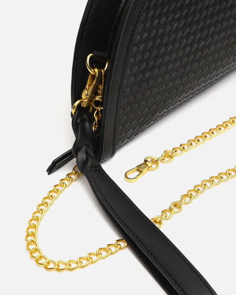 Empadi bolso de fiesta en media luna trenzado con asa bandolera extraíble ED.