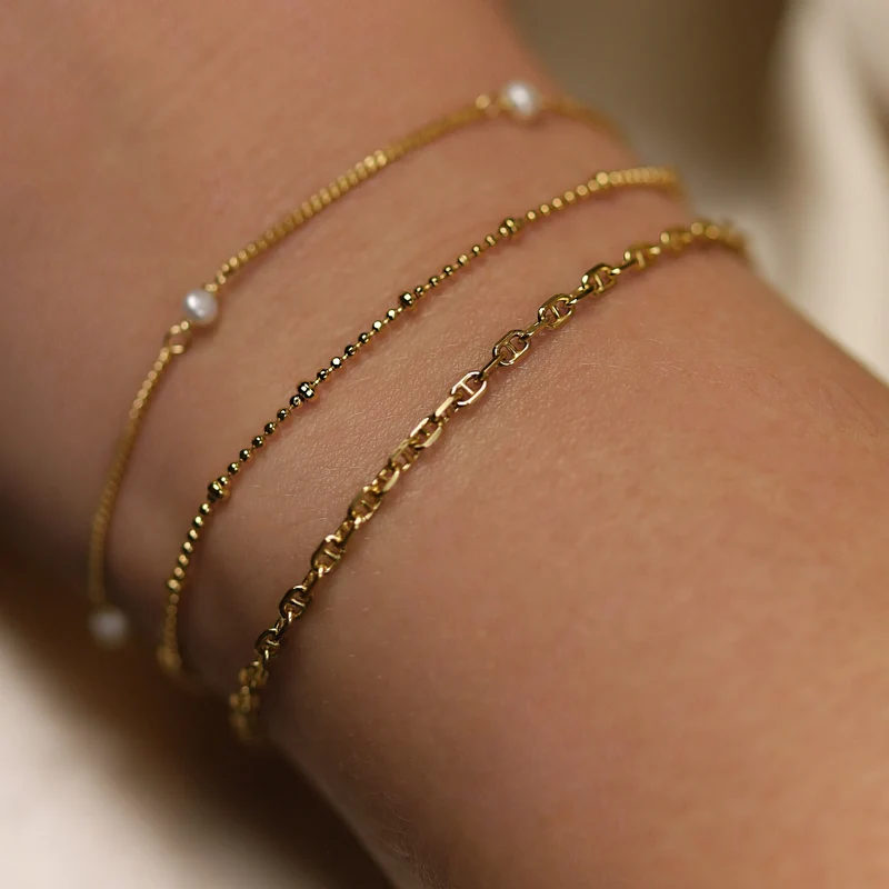 Karma 925 Sterling Silver Gold-coloured Dots Diamonds Bracelet 94127GP (Length: 16.50 - 19.00 cm)