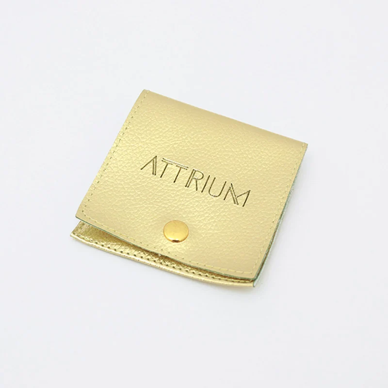 Bolsa De Polipiel Attrium Dorada Botón