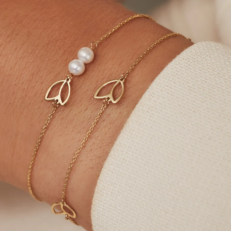 Isabel Bernard Cadeau d'Isabel 14 karaat gouden armband en oorknopjes giftset met zoetwaterparels IB90185